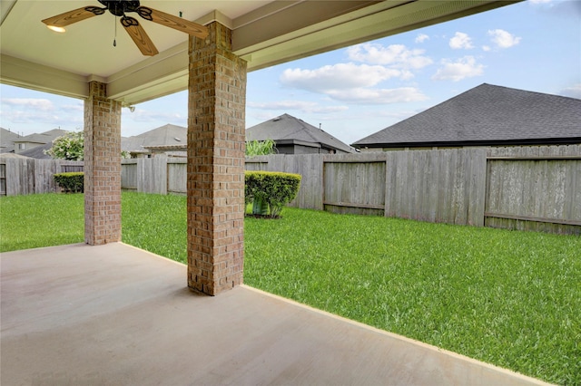 8426 Kari Bend Cir, Richmond, TX 77407 - fenced backyard featuring a ceiling fan and a patio