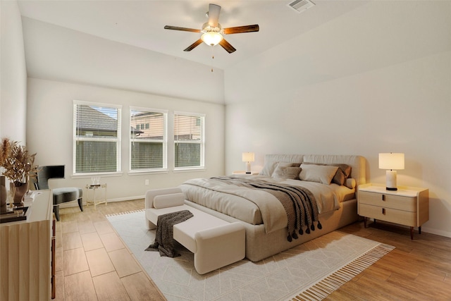 8426 Kari Bend Cir, Richmond, TX 77407 - bedroom featuring light wood-style flooring, ceiling fan, and lofted ceiling