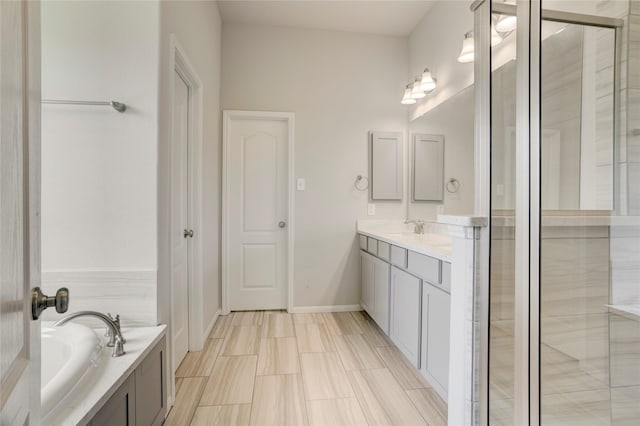8426 Kari Bend Cir, Richmond, TX 77407 - full bath featuring vanity, a bath, and a shower stall
