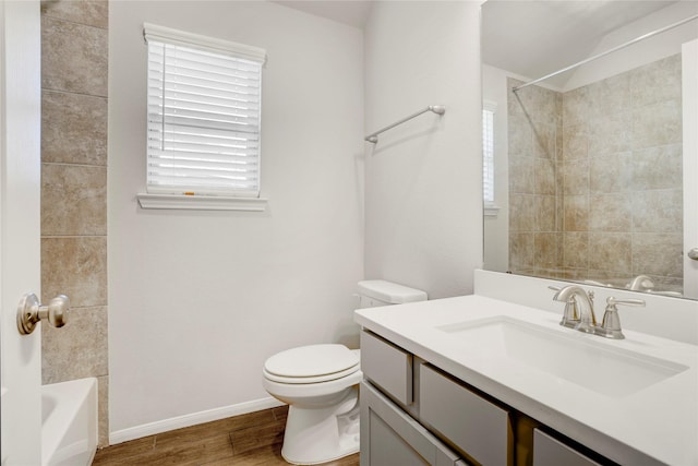 8426 Kari Bend Cir, Richmond, TX 77407 - full bath with vanity, wood finished floors, and bathing tub / shower combination