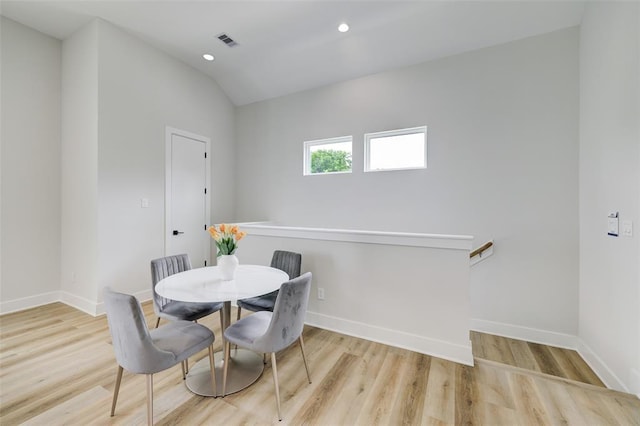 846 Elkhart St Unit B, Houston, TX 77091 - dining area featuring wood finished floors, lofted ceiling, and recessed lighting