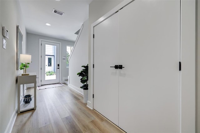 846 Elkhart St Unit B, Houston, TX 77091 - foyer entrance with light wood-type flooring and recessed lighting