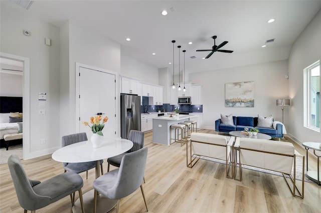 846 Elkhart St Unit B, Houston, TX 77091 - dining space featuring a ceiling fan, light wood-style floors, and recessed lighting