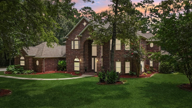 10530 Clubhouse Cir, Magnolia, TX 77354 - view of front of house featuring a front lawn and brick siding