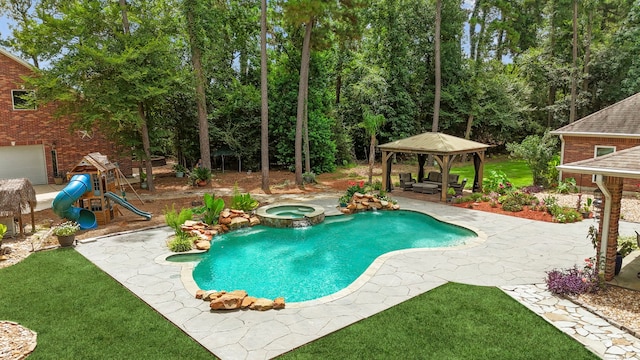 10530 Clubhouse Cir, Magnolia, TX 77354 - view of swimming pool featuring a gazebo, a patio area, a lawn, and a pool with connected hot tub