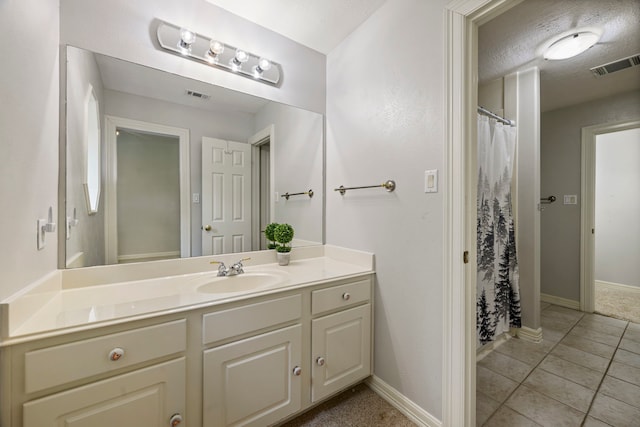 10530 Clubhouse Cir, Magnolia, TX 77354 - full bathroom featuring vanity, tile patterned flooring, and a shower with curtain