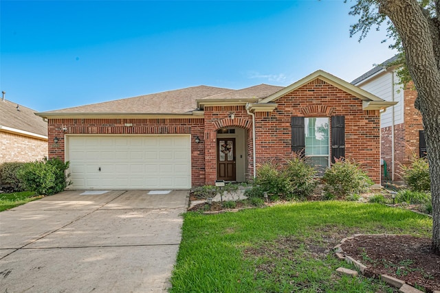 19914 Pemetic Trl, Richmond, TX 77407 - single story home featuring brick siding, driveway, an attached garage, a shingled roof, and a front yard