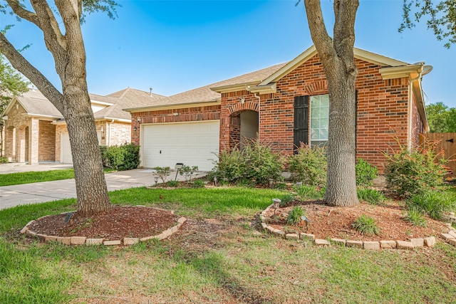 19914 Pemetic Trl, Richmond, TX 77407 - ranch-style house featuring brick siding, an attached garage, concrete driveway, and a shingled roof