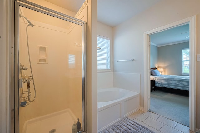 19914 Pemetic Trl, Richmond, TX 77407 - bathroom featuring connected bathroom, a stall shower, a garden tub, tile patterned floors, and ornamental molding