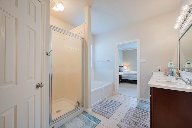 19914 Pemetic Trl, Richmond, TX 77407 - full bath featuring a shower stall, tile patterned floors, double vanity, and connected bathroom