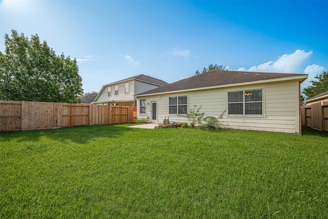 19914 Pemetic Trl, Richmond, TX 77407 - back of house with a fenced backyard