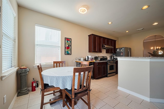19914 Pemetic Trl, Richmond, TX 77407 - dining space with light tile patterned floors, recessed lighting, and a chandelier