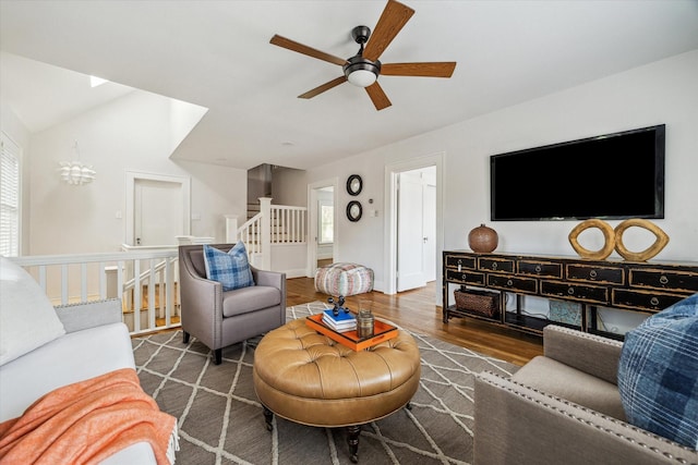 1656 Norfolk St, Houston, TX 77006 - living area with a ceiling fan, wood finished floors, stairs, and vaulted ceiling