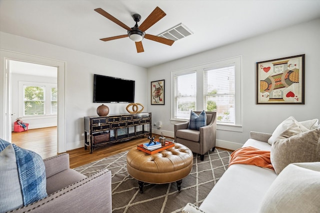 1656 Norfolk St, Houston, TX 77006 - living room with wood finished floors and ceiling fan