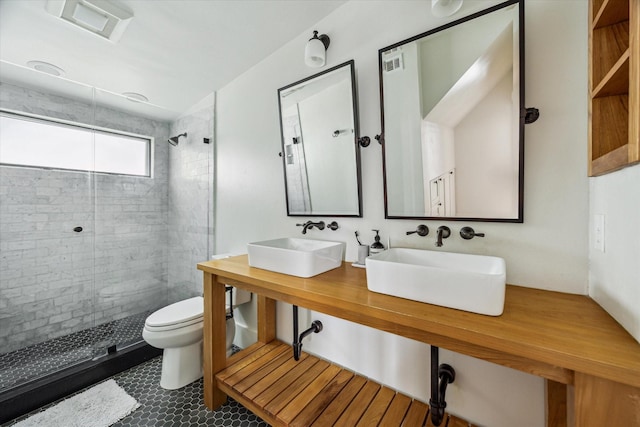1656 Norfolk St, Houston, TX 77006 - full bath with a shower stall and double vanity