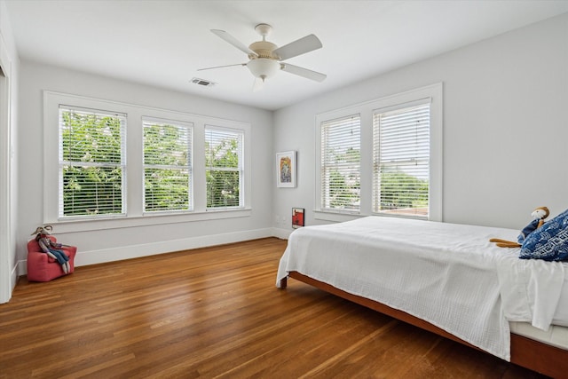 1656 Norfolk St, Houston, TX 77006 - bedroom with wood finished floors and a ceiling fan