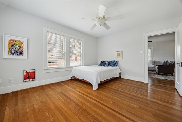 1656 Norfolk St, Houston, TX 77006 - bedroom featuring wood finished floors and ceiling fan