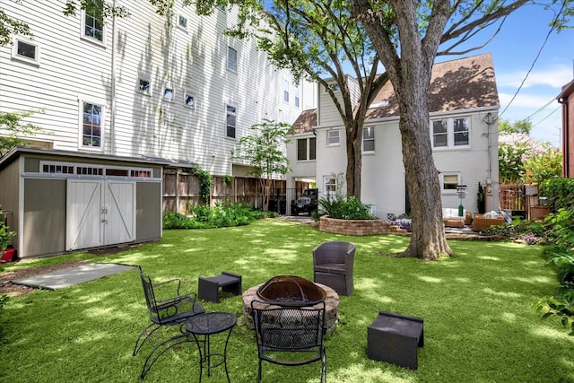 1656 Norfolk St, Houston, TX 77006 - view of yard featuring a shed and a fire pit