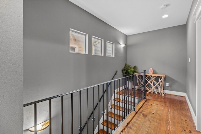 112 Riley Ln, Houston, TX 77003 - hall with an upstairs landing and wood-type flooring