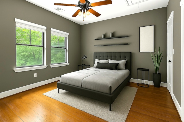 112 Riley Ln, Houston, TX 77003 - bedroom with wood finished floors and a ceiling fan
