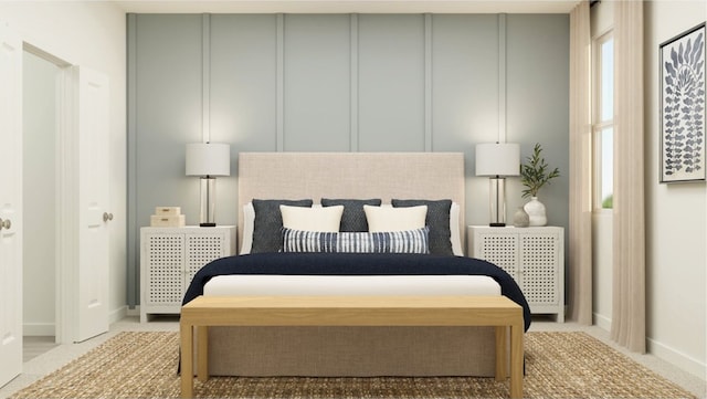 16042 Tallis Dr, Conroe, TX 77303 - carpeted bedroom featuring baseboards and a decorative wall