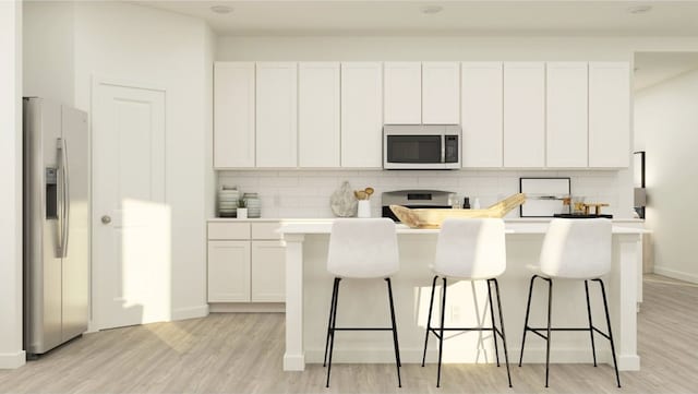 16042 Tallis Dr, Conroe, TX 77303 - kitchen with white microwave, stainless steel fridge with ice dispenser, range with electric cooktop, and backsplash