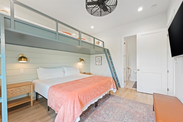 3430 Indian Beach Dr, Galveston, TX 77554 - bedroom featuring light wood-style floors, recessed lighting, and ensuite bath