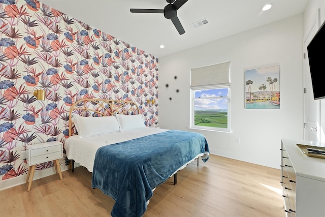 3430 Indian Beach Dr, Galveston, TX 77554 - bedroom featuring light wood-style flooring, recessed lighting, and a ceiling fan