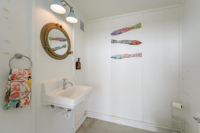 3430 Indian Beach Dr, Galveston, TX 77554 - half bathroom featuring toilet and a sink