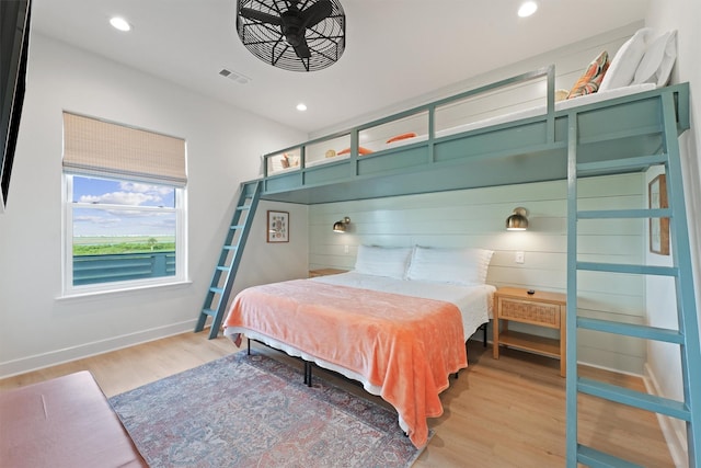 3430 Indian Beach Dr, Galveston, TX 77554 - bedroom with light wood-type flooring and recessed lighting