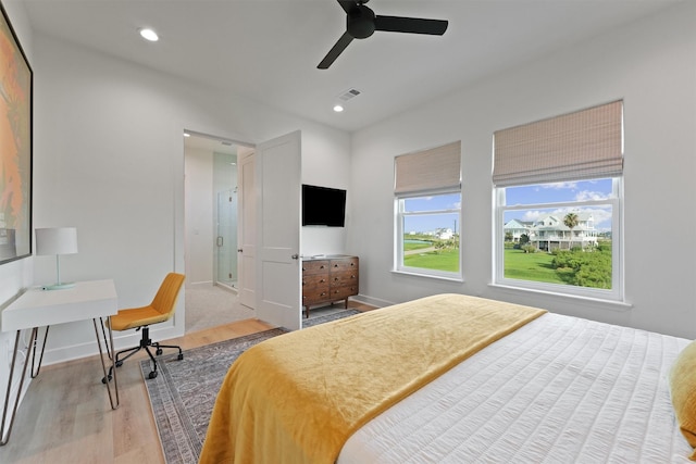 3430 Indian Beach Dr, Galveston, TX 77554 - bedroom with light wood-style flooring, recessed lighting, and ceiling fan