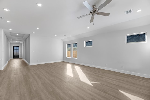 21410 Flora Springs Ln, Magnolia, TX 77355 - unfurnished living room with light wood-style flooring, recessed lighting, and ceiling fan