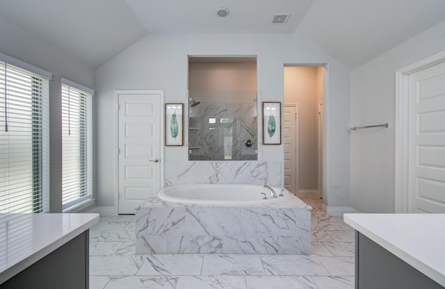 20207 Noble Arabian Dr, Tomball, TX 77377 - full bath featuring marble finish flooring, vaulted ceiling, a garden tub, vanity, and a marble finish shower