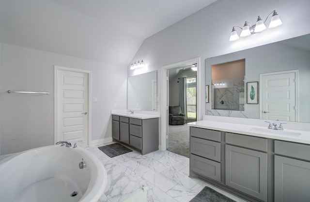 20207 Noble Arabian Dr, Tomball, TX 77377 - bathroom featuring vaulted ceiling, two vanities, a bath, marble finish flooring, and a shower