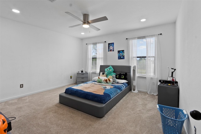 13206 Blass Ct, Houston, TX 77044 - carpeted bedroom featuring multiple windows, recessed lighting, and a ceiling fan
