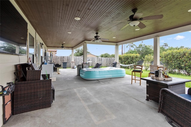13206 Blass Ct, Houston, TX 77044 - fenced backyard featuring outdoor dining space, ceiling fan, a patio area, and an outdoor living space