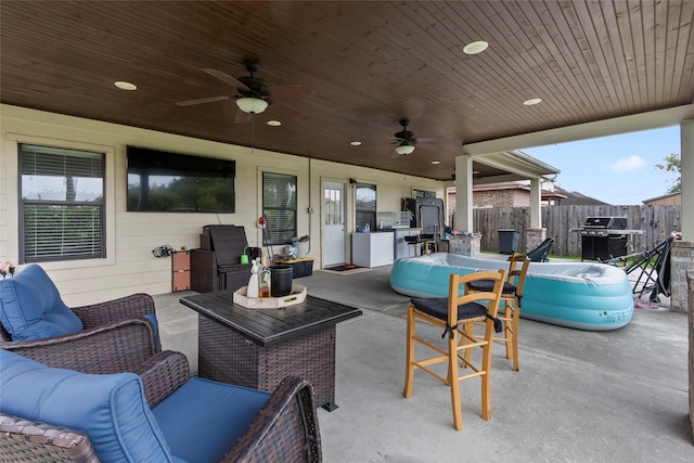 13206 Blass Ct, Houston, TX 77044 - view of patio / terrace with grilling area, an outdoor living space, and a ceiling fan