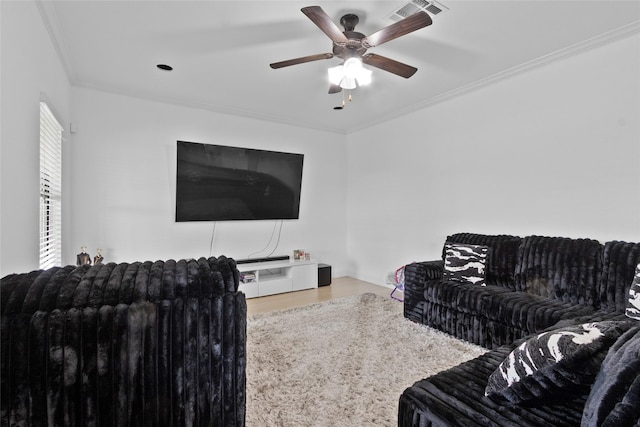 13206 Blass Ct, Houston, TX 77044 - living area with ceiling fan, crown molding, and wood finished floors