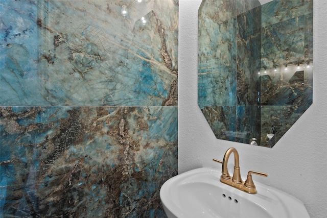 13206 Blass Ct, Houston, TX 77044 - bathroom with a sink and a textured wall