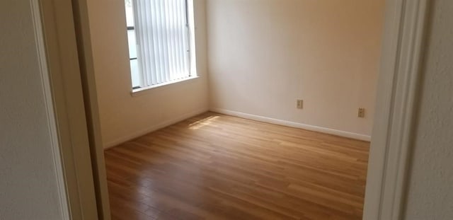 2300 Old Spanish Trl Unit 2116, Houston, TX 77054 - unfurnished room featuring light wood finished floors and baseboards
