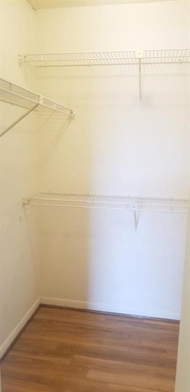 2300 Old Spanish Trl Unit 2116, Houston, TX 77054 - spacious closet featuring wood finished floors