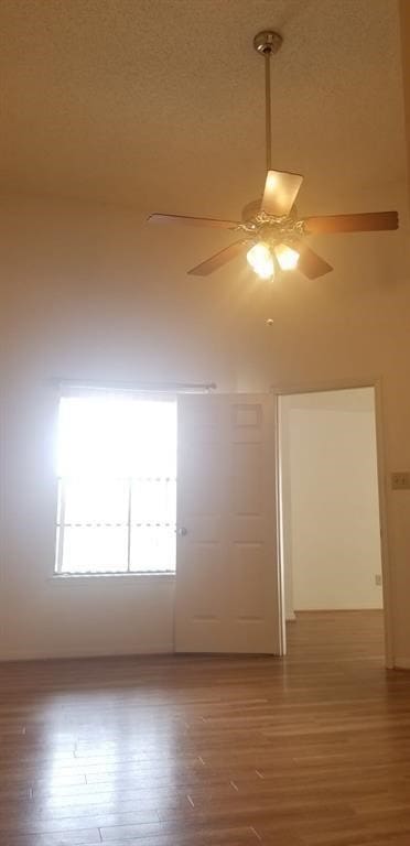 2300 Old Spanish Trl Unit 2116, Houston, TX 77054 - empty room featuring a ceiling fan and wood finished floors