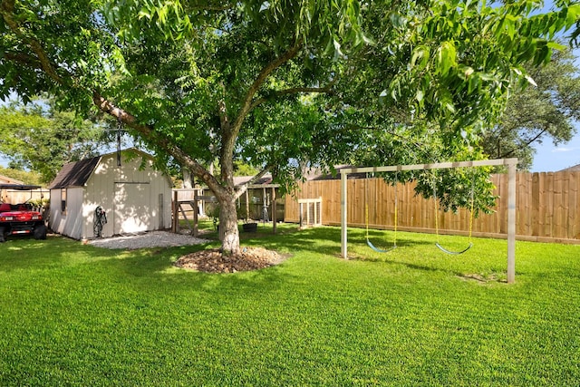 2605 Perry Ln, Alvin, TX 77511 - view of yard featuring a storage unit