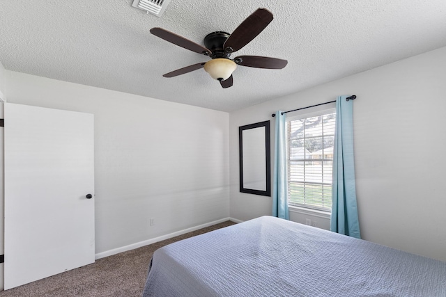 2605 Perry Ln, Alvin, TX 77511 - bedroom featuring carpet floors, a textured ceiling, and ceiling fan