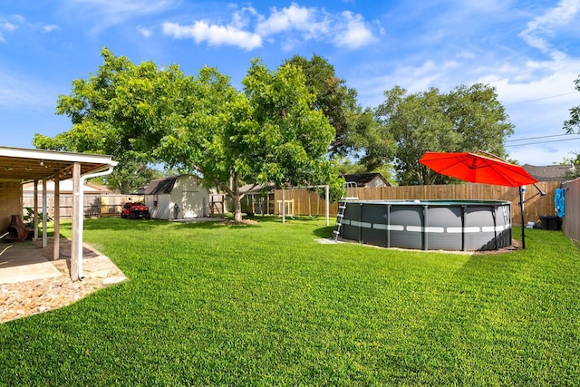 2605 Perry Ln, Alvin, TX 77511 - fenced backyard with a shed