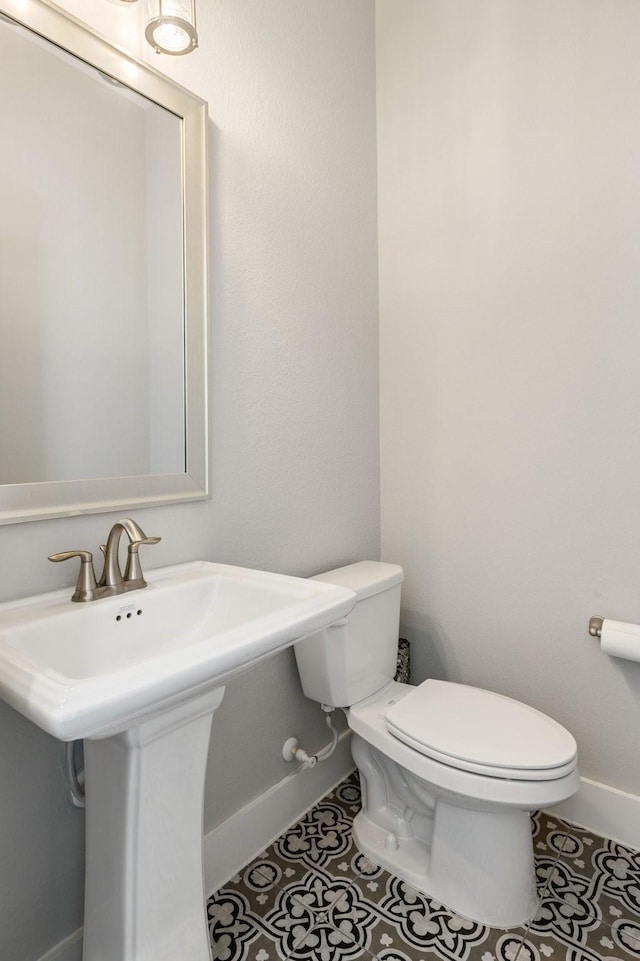 16726 Echo Heights Dr, Cypress, TX 77433 - half bath featuring toilet and tile patterned floors