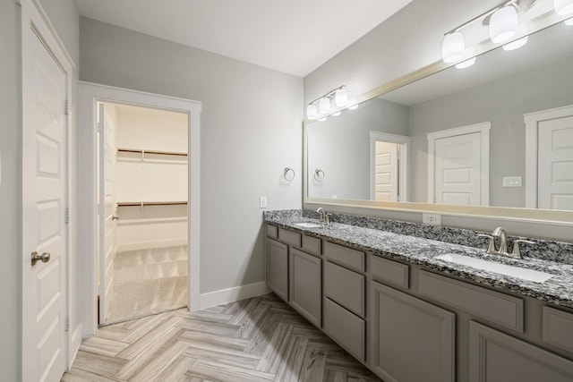 16726 Echo Heights Dr, Cypress, TX 77433 - full bathroom featuring double vanity and a walk in closet