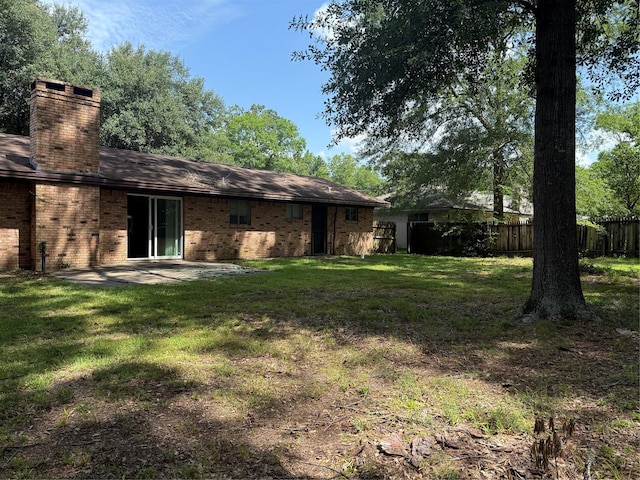 200 Cunningham Dr, Lufkin, TX 75901 - view of yard featuring a patio