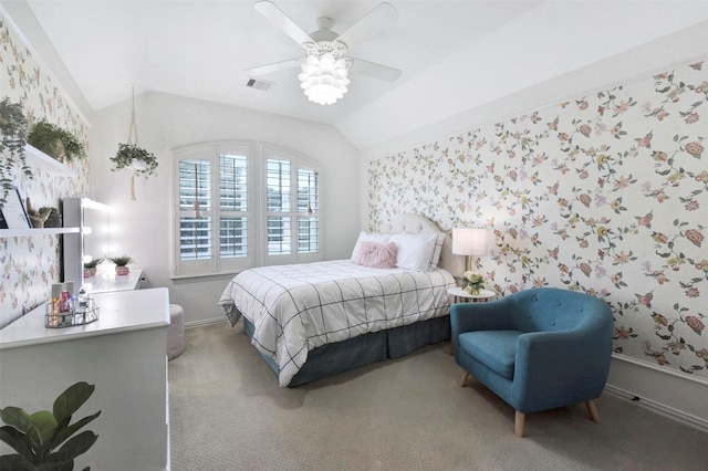 23706 Tristan Bay Ct, Spring, TX 77386 - bedroom featuring multiple windows, wallpapered walls, vaulted ceiling, ceiling fan, and light colored carpet