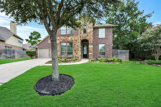 23706 Tristan Bay Ct, Spring, TX 77386 - traditional-style house featuring driveway, stone siding, brick siding, and an attached garage